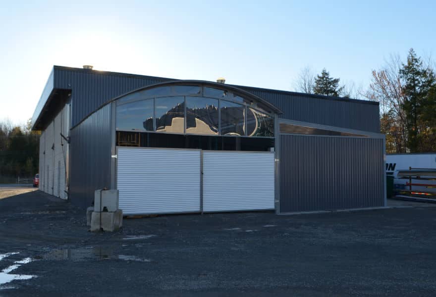 Aerial view entrance portico with polycarbonate roof