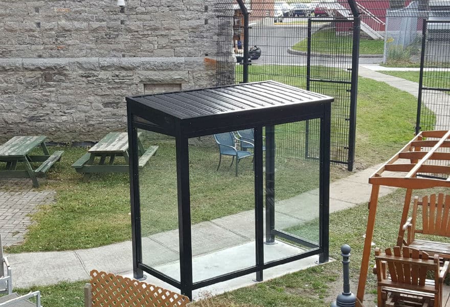 Smoking shelter with glass walls