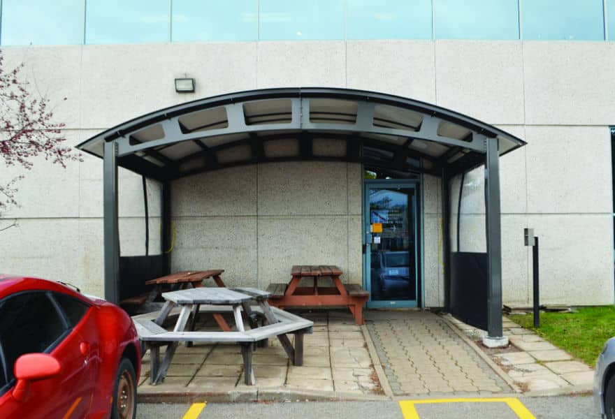 Smoking shelter with glass walls