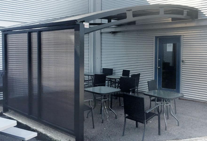 Smoking shelter with glass walls