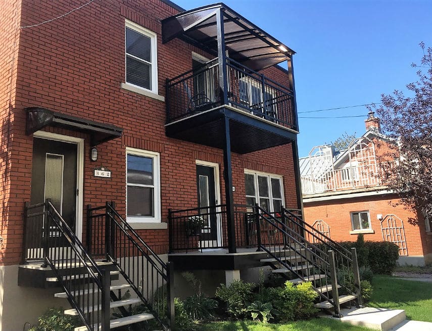 Portico entrance shelter in condo block