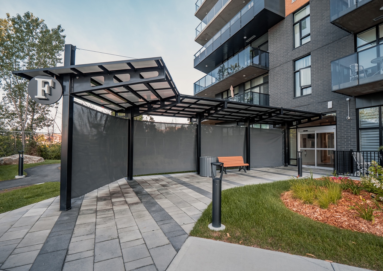 Portico entrance shelter in condo block