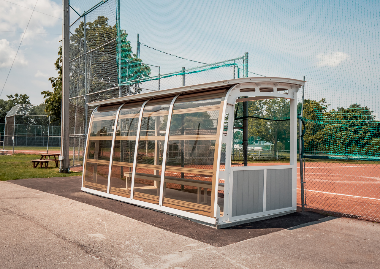 Exterior view of a park shelter on a baseball field