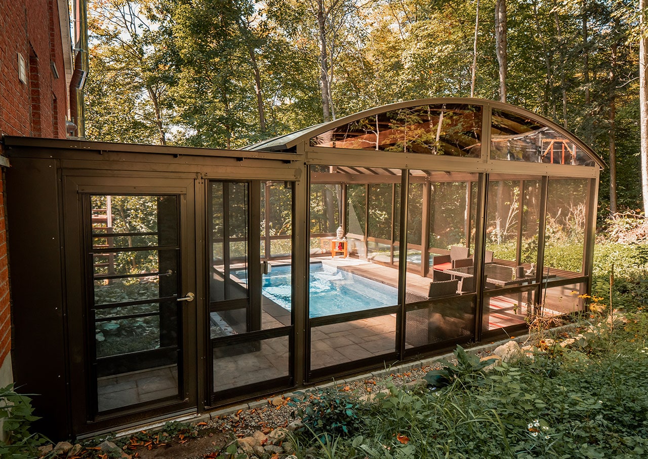 Exterior view of a Tendal pool shelter